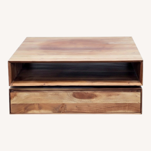 Used CB2 Spin Rotating Coffee Table with Two Drawers for sale on AptDeco