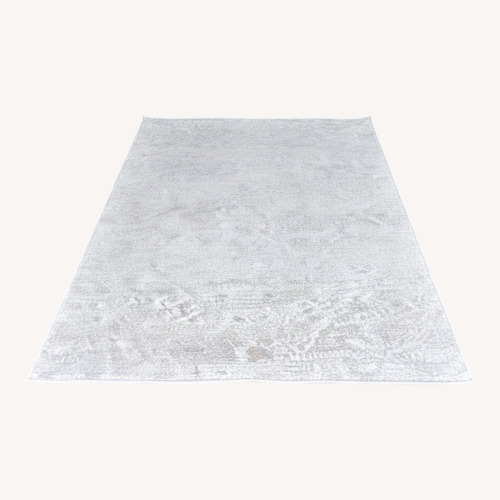 Used Calvin Klein Environments 5x7 Light Grey Textured  for sale on AptDeco