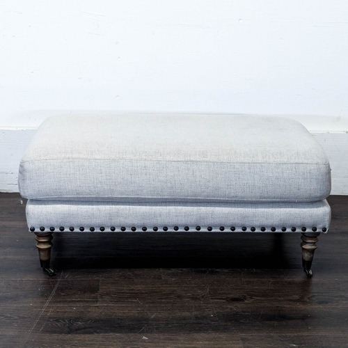 Used Upholstered Ottoman with Nailhead Trim	 for sale on AptDeco