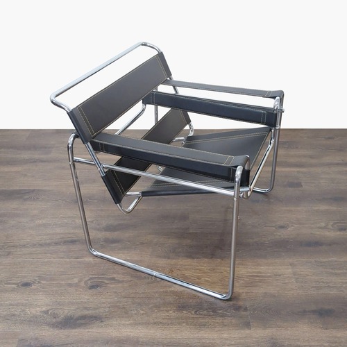 Used Modern Black Leather and Chrome Lounge Chair for sale on AptDeco