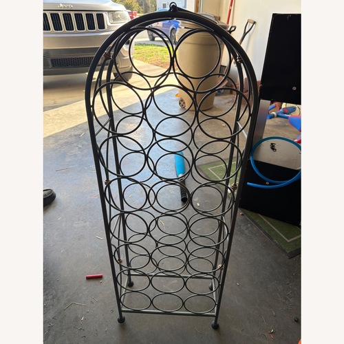 Used Metal Wine Rack with Handle for sale on AptDeco