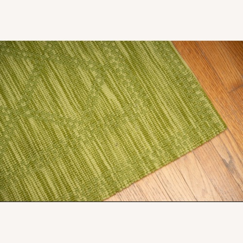 Used Showroom Area Rug 12' x 13' for sale on AptDeco