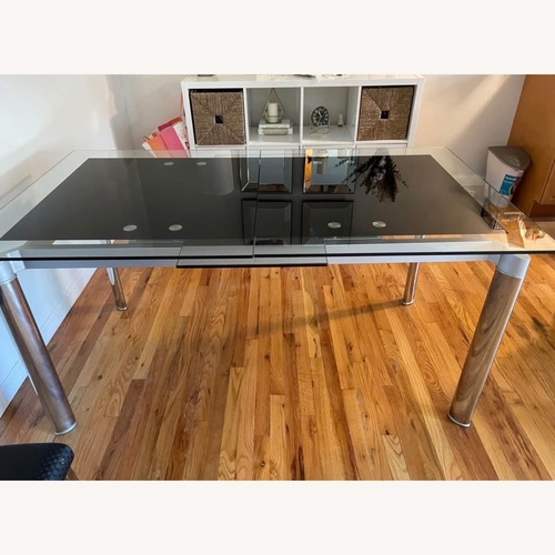 Used Vintage/Antique Black Glass Dining Table for sale on AptDeco