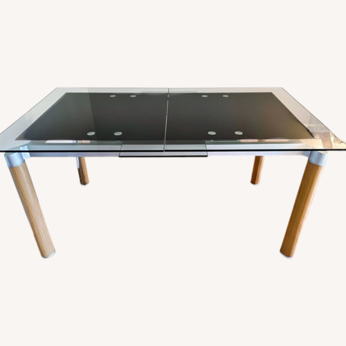 Used Vintage/Antique Black Glass Dining Table for sale on AptDeco