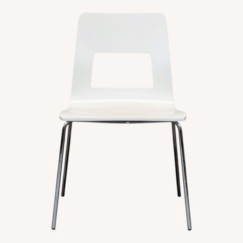 Used Wood Dining Chair with Cut-Out Design for sale on AptDeco