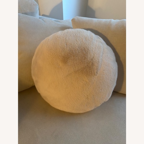 Used CB2 Round Ivory White Faux Fur Throw Pillow 16" for sale on AptDeco