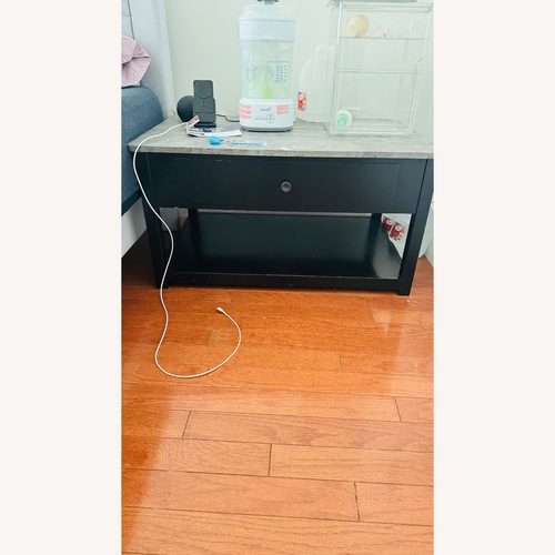 Used Raymour & Flanigan Light Gray Wood Coffee Table for sale on AptDeco