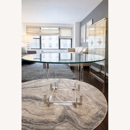 Used Safavieh Koryn Silver Glass Dining Table for sale on AptDeco