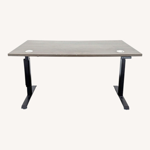 Used Electric Adjustable Standing Desk with Modern Wood for sale on AptDeco