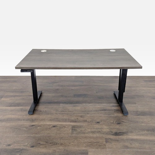Used Electric Adjustable Standing Desk with Modern Wood for sale on AptDeco
