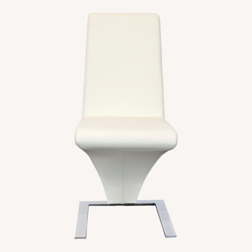 Used Faux Leather and Metal Dining Chair for sale on AptDeco