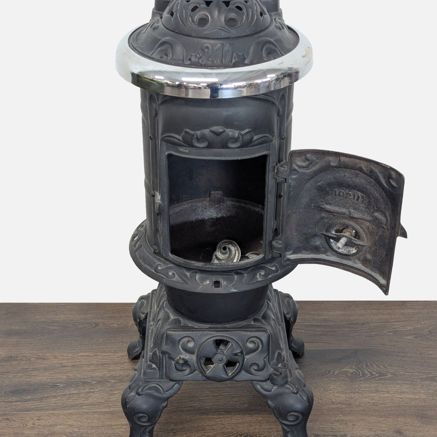 Antique Iron Parlor Stove with Decorative Silver - image-7