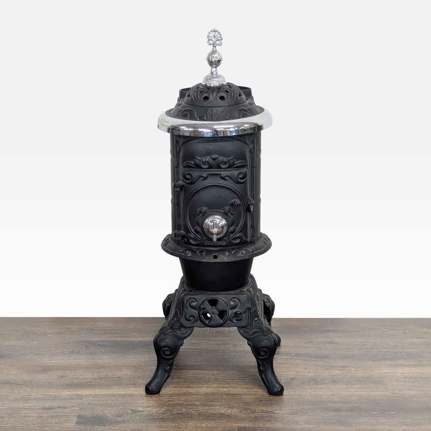 Antique Iron Parlor Stove with Decorative Silver - image-1