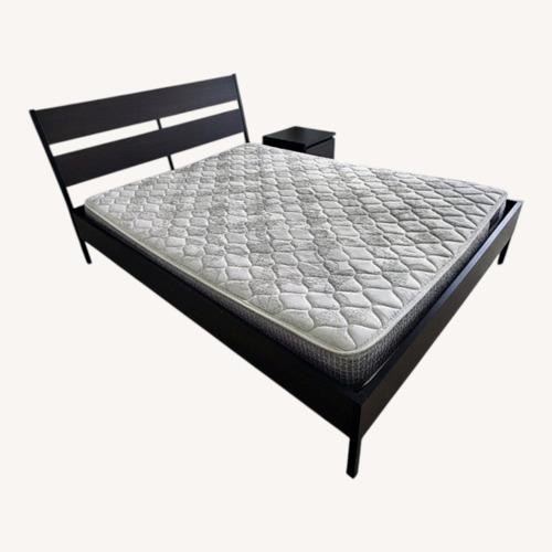 Used Dark Brown Wood Queen Bed for sale on AptDeco