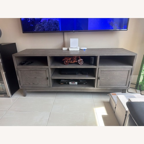 Used Living Spaces Dark Gray Wood Media Storage for sale on AptDeco