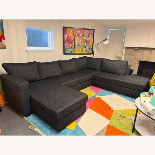 Used U Shaped Dark Grey Sofa Bed  for sale on AptDeco