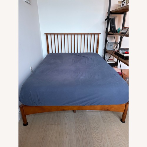 Used Natural Wood Full Bed for sale on AptDeco