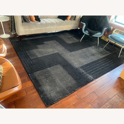 Used CB2 Black Larso Fabric Area Rug 9' x 12' for sale on AptDeco