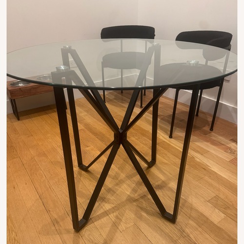 Used Mercury Row Seibold Black Glass Dining Table for sale on AptDeco