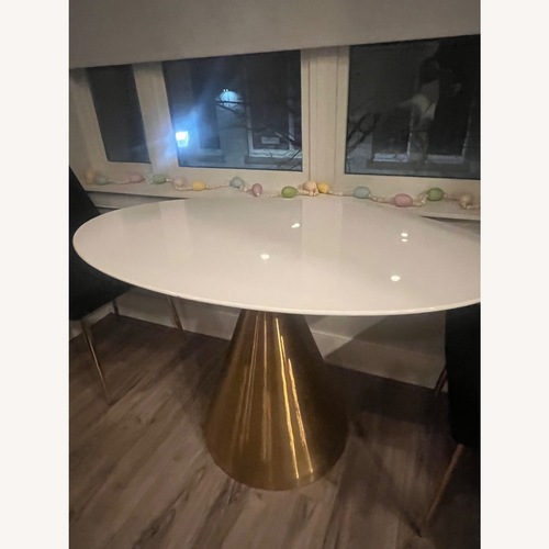 Used White Ceramic Dining Table for sale on AptDeco