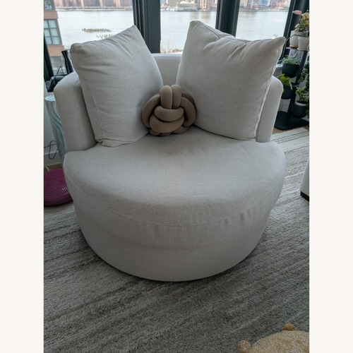 Used Pottery Barn Swivel Armchair 40" for sale on AptDeco