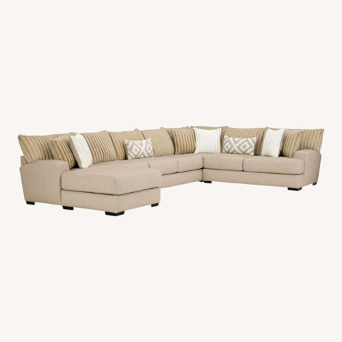 Used Raymour & Flanigan Natural 3+ Piece Sectional for sale on AptDeco