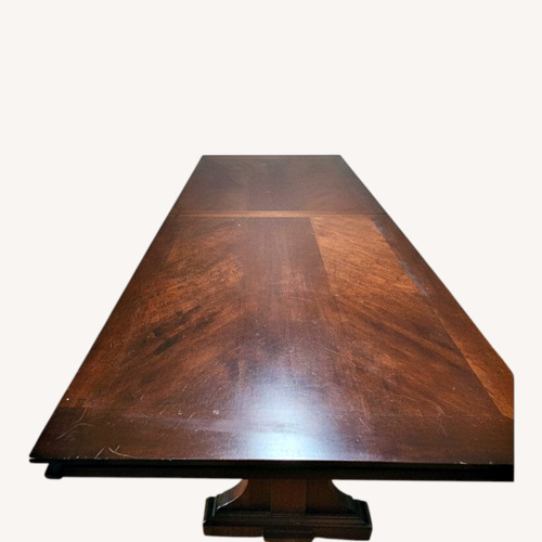 Used Dark Brown Wood Dining Table & 4 Chairs for sale on AptDeco