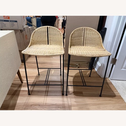 Used CB2 Cesta Rattan Counter Stools for sale on AptDeco