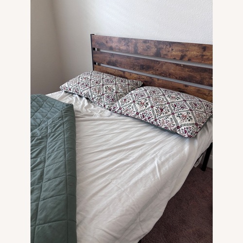 Used Dark Brown Metal Twin Bed for sale on AptDeco