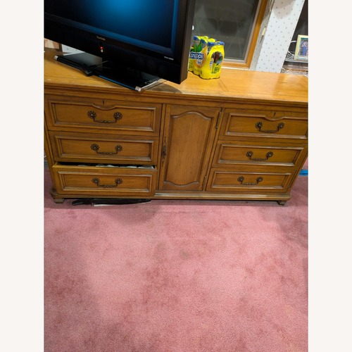 Used Vintage/Antique Dark Brown Wood Dresser for sale on AptDeco