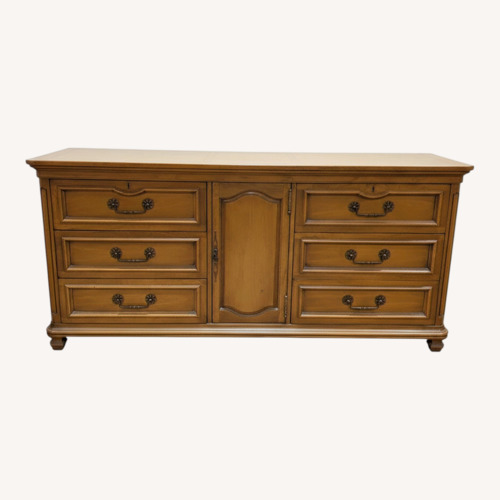 Used Vintage/Antique Dark Brown Wood Dresser for sale on AptDeco