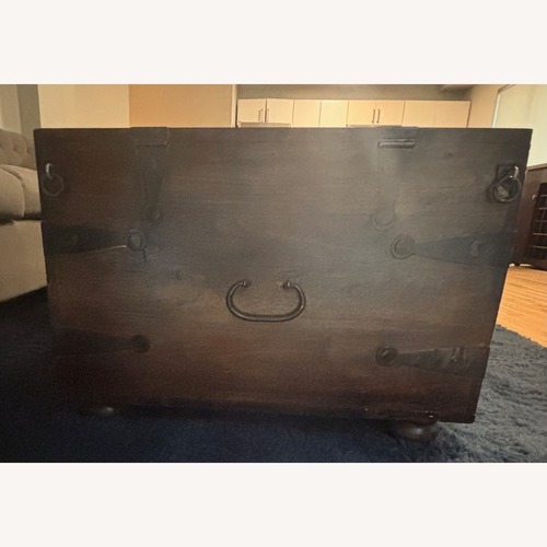 Used Crate & Barrel Taka Storage Trunk Coffee Table for sale on AptDeco
