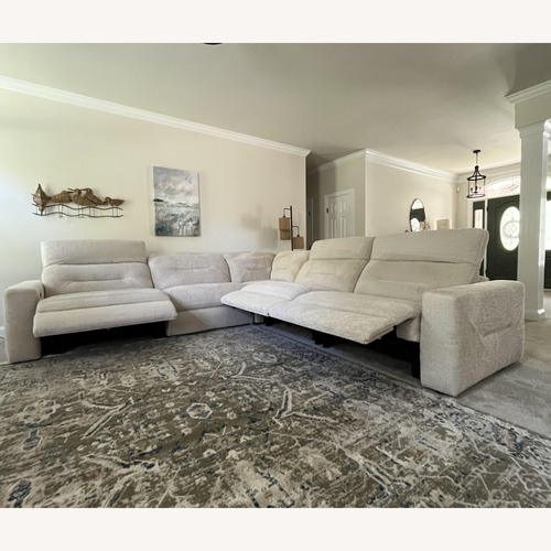 Used Rooms To Go  Natural 3+ Reclining Sectional Seater Sofa for sale on AptDeco