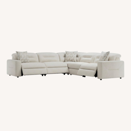 Used Rooms To Go  Natural 3+ Reclining Sectional Seater Sofa for sale on AptDeco