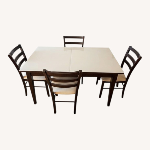 Used Italian Extendable Dining Table + 4 Chairs for sale on AptDeco