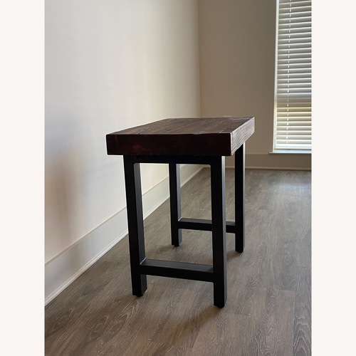 Used Pottery Barn Griffin Dark Brown Wood Side Table for sale on AptDeco