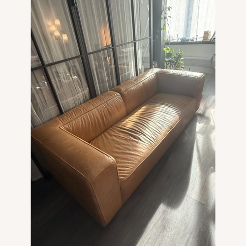 Used CB2 Lenyx Saddle Leather Sofa for sale on AptDeco