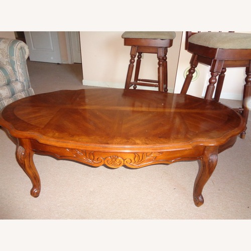 Used French Provincial Oval Coffee Table for sale on AptDeco