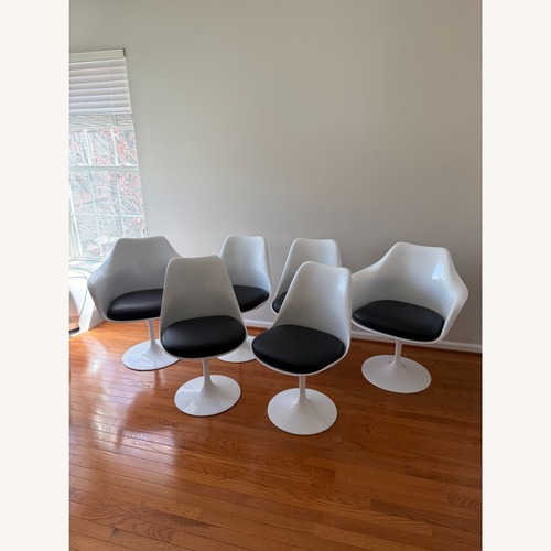 Used Authentic Knoll Tulip Chairs 6 Black Leather for sale on AptDeco