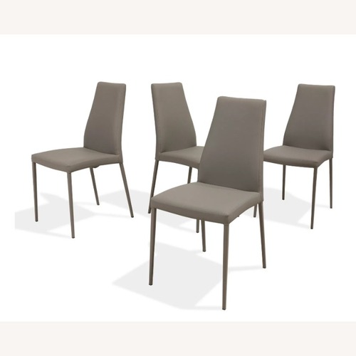 Used Calligaris Aida Light Gray Leather Dining Chairs for sale on AptDeco