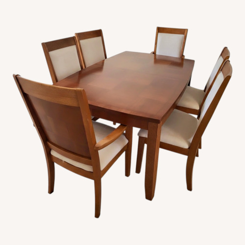 Used Extendable Dining Table with Six Chairs  for sale on AptDeco