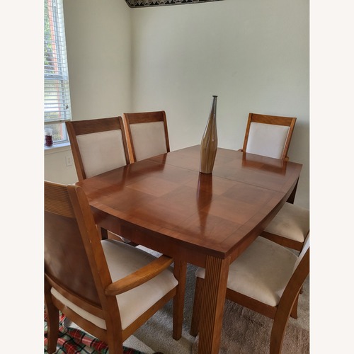 Used Extendable Dining Table with Six Chairs  for sale on AptDeco