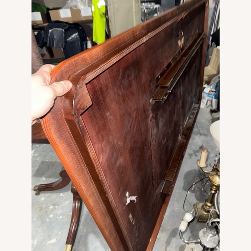 Used Vintage/Antique Dark Brown Dining Table for sale on AptDeco