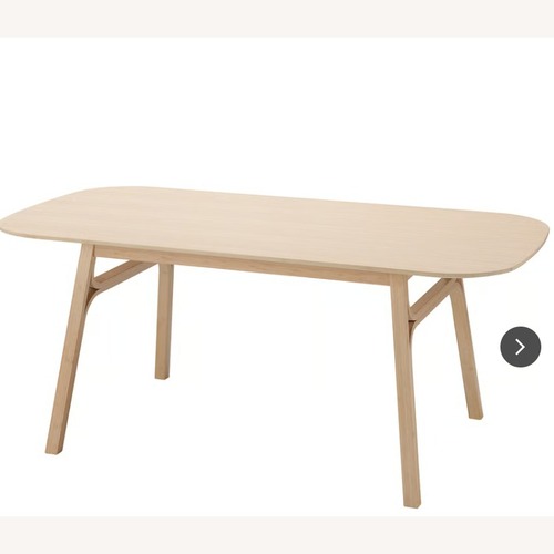Used IKEA Voxlov Natural Bamboo Dining Table for sale on AptDeco