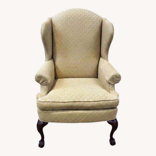 Used Upholstered Wingback w Wood Claw Feet Chair for sale on AptDeco