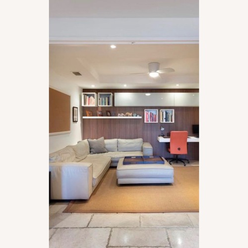 Used Italian L Leather Sectional for sale on AptDeco