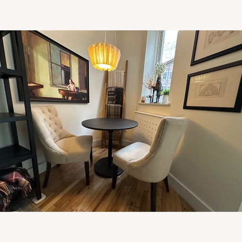 Used Pottery Barn Hayes Tufted Dining Chairs for sale on AptDeco