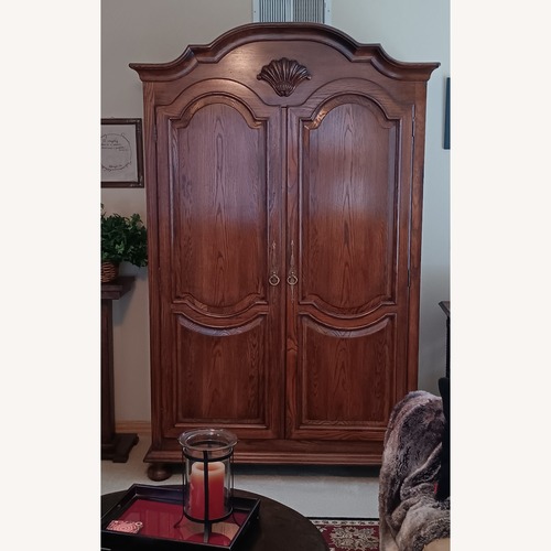 Used Century Furniture Dark Brown Wood Armoire for sale on AptDeco