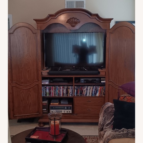 Used Century Furniture Dark Brown Wood Armoire for sale on AptDeco