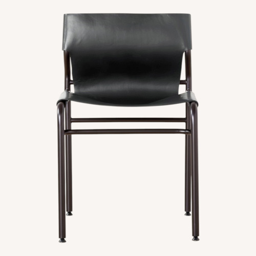 Used CB2 Surf Sling Black Leather Dining Chairs for sale on AptDeco